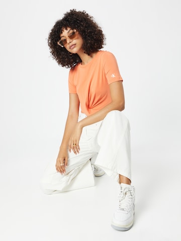 Calvin Klein Jeans - Camiseta en naranja