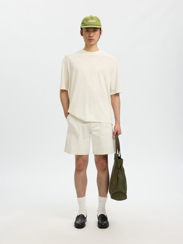 SELECTED - Gorra 'Selected x Hotel Amour' en verde