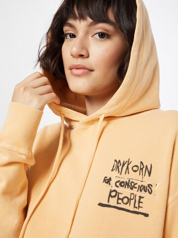 DRYKORN Sweatshirt 'DRYKORN x ABOUT YOU BRADLEY_CONSCIOUS' in Orange