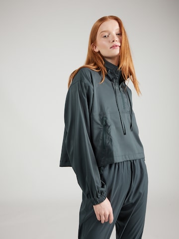 Girlfriend Collective - Chaqueta deportiva 'Hummingbird' en verde