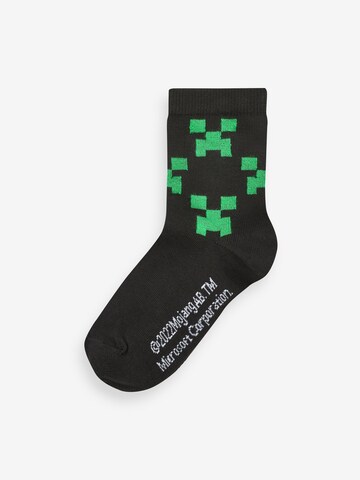 Next Sockor i grå