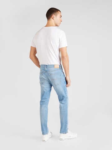 Tommy Jeans Slimfit Jeans 'AUSTIN SLIM TAPERED' in Blauw