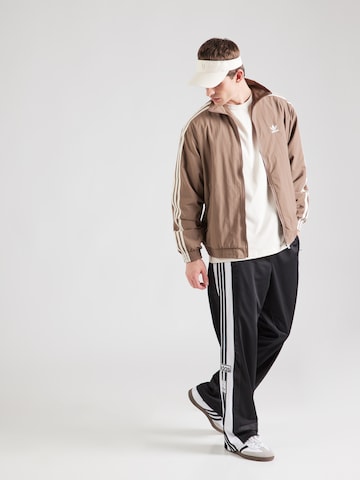 ADIDAS ORIGINALS Between-Season Jacket 'Adicolor Firebird' in Brown