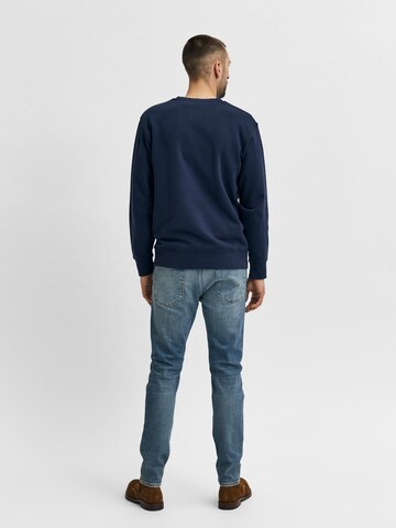 Coupe slim Jean 'Leon' SELECTED HOMME en bleu