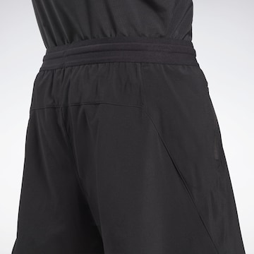 Regular Pantalon de sport Reebok en noir