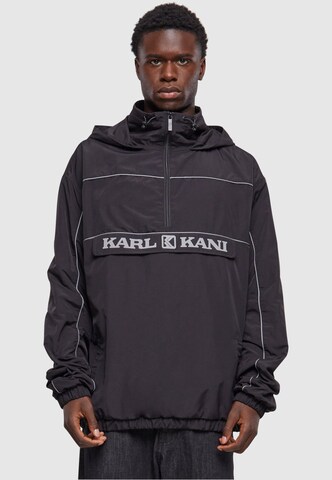 Karl Kani Between-season jacket in Black: front