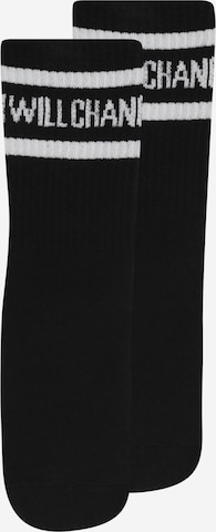 SOMETIME SOON Socks in Black: front