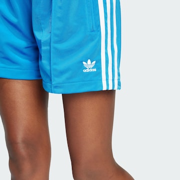 ADIDAS ORIGINALS Loose fit Sports trousers 'Firebird' in Blue