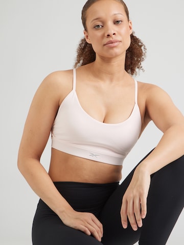 Reebok - Bustier Sujetador deportivo en rosa: frente