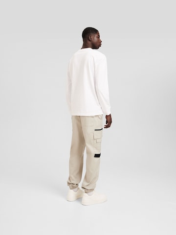 Tapered Pantaloni cargo di Bershka in beige