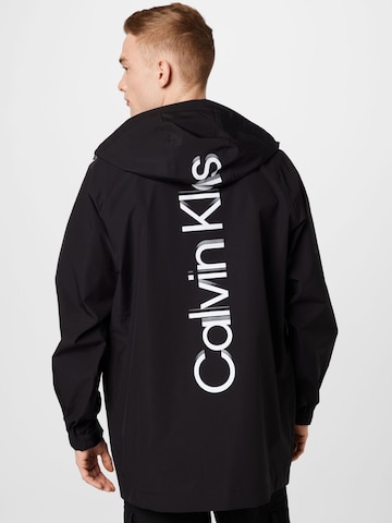 Calvin Klein Jeans Between-Seasons Coat in Black