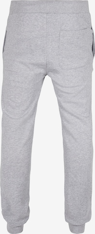 Tapered Pantaloni di Urban Classics in grigio