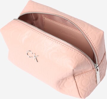 Calvin Klein Make up tas in Roze