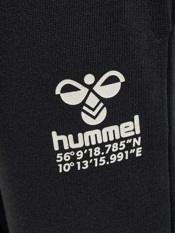 Effilé Pantalon de sport 'GLOBAL' Hummel en noir