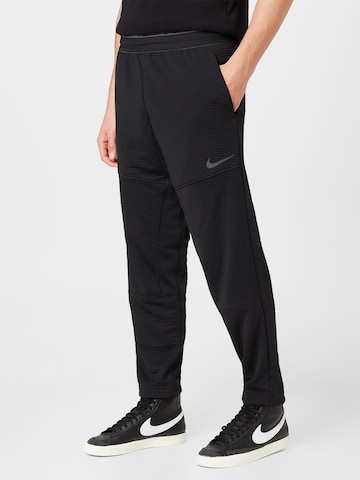 NIKE Regular Workout Pants 'Pro' in Black: front