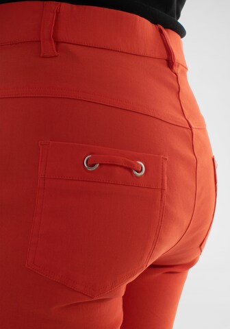 Navigazione Slim fit Pants in Orange