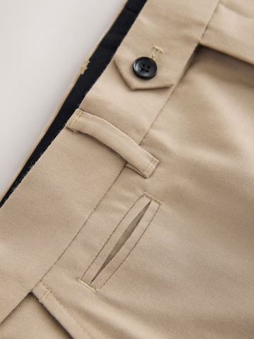 Next Slimfit Ráncos nadrág - bézs