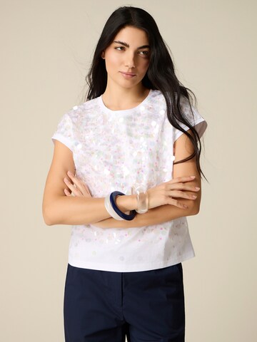Top di oltre in bianco: frontale