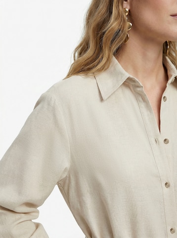 KAVAZI Платье в Бежевый