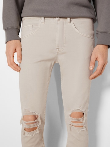 Bershka Slimfit Farkut värissä beige