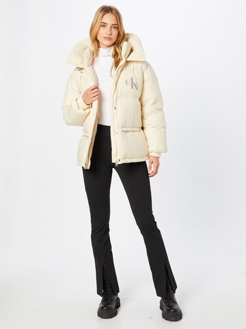 Calvin Klein Jeans Kurtka zimowa w kolorze beżowy