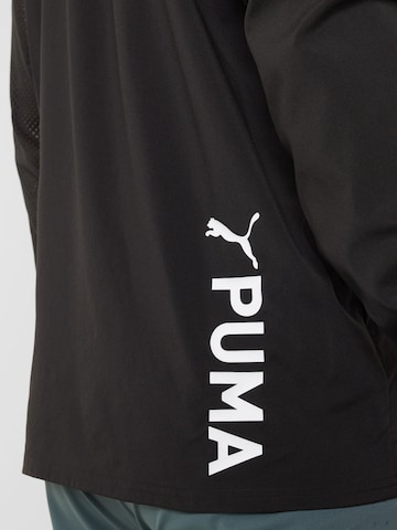 PUMA Sportsweatshirt in Zwart