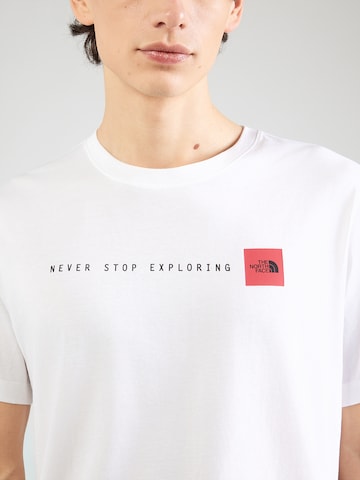 THE NORTH FACE Paita 'NEVER STOP EXPLORING' värissä valkoinen