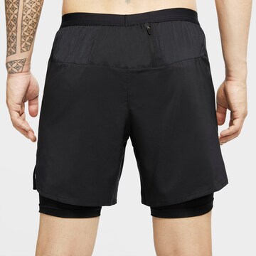 NIKE Regular Sportshorts 'Flex Stride' in Schwarz