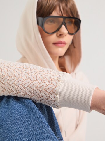 ABOUT YOU Sweatshirt in Beige