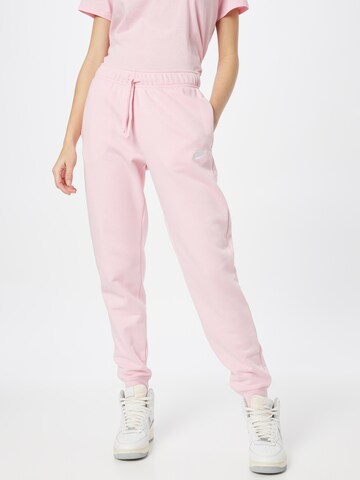 Nike Sportswear Tapered Trousers in Pink: front