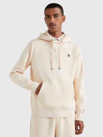 Sweat-shirt TOMMY HILFIGER en beige : devant