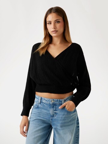 GUESS Pullover in Schwarz: Vorderseite