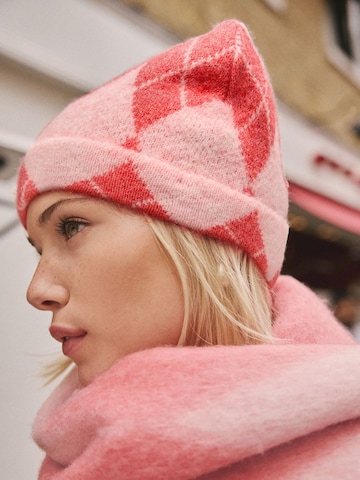 Bonnet Next en rouge