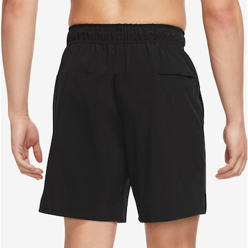 Regular Pantaloni sport 'Unlimited' de la NIKE pe negru