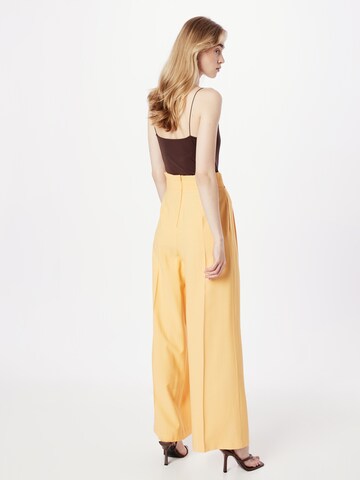NAF NAF Wide leg Pleat-front trousers 'ERIKA' in Yellow
