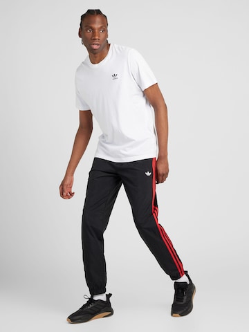 ADIDAS ORIGINALS - Tapered Pantalón 'Rekive ' en negro