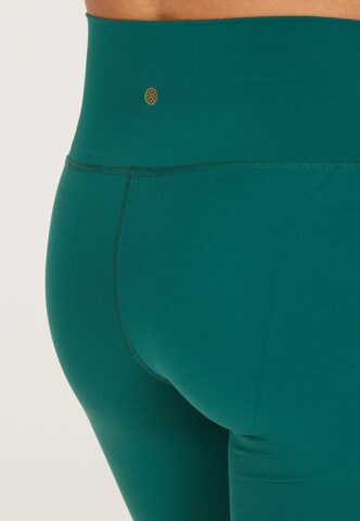 Athlecia Skinny Workout Pants 'Almy' in Green