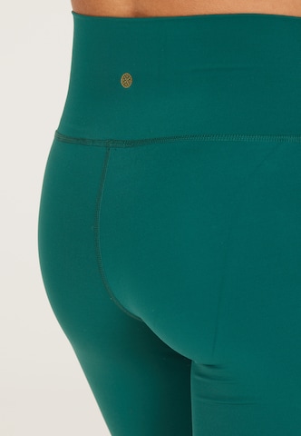 Athlecia Skinny Workout Pants 'Almy' in Green