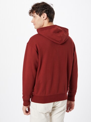 LEVI'S ® Sweatjacka 'Relaxed Graphic Zipup' i röd