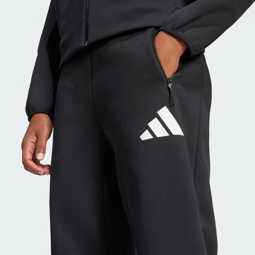 ADIDAS SPORTSWEAR Loosefit Παντελόνι φόρμας 'Z.N.E.' σε μαύρο