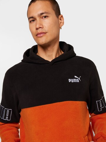 PUMA Sportsweatshirt in Bruin