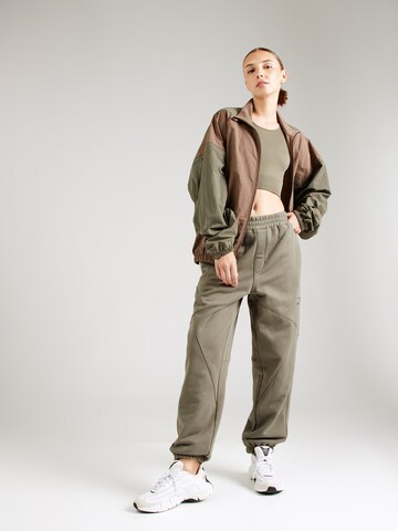 Reebok Конический (Tapered) Штаны в Зеленый