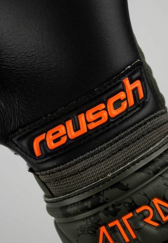 REUSCH Sporthandschoenen 'Attrakt Grip Evolution Finger Support' in Zwart