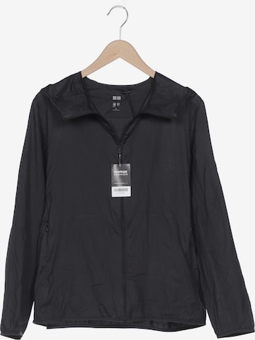 UNIQLO Jacke XL in Schwarz: predná strana