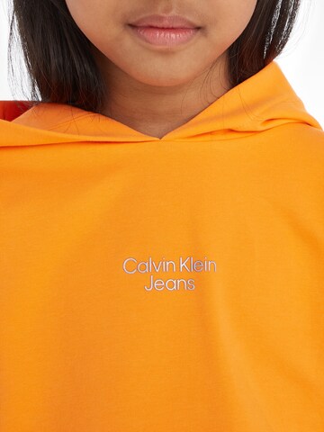 Felpa di Calvin Klein Jeans in arancione