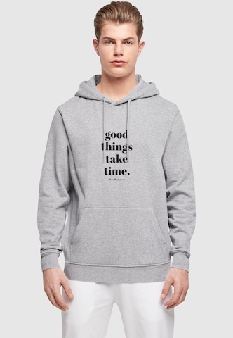 Merchcode Sweatshirt 'Good Things Take Time' in Grau: Vorderseite