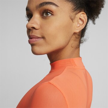 PUMA Shirt 'DARE TO' in Oranje