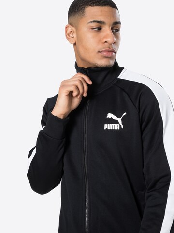 PUMA Sportsweatjacke 'Iconic T7' in Schwarz