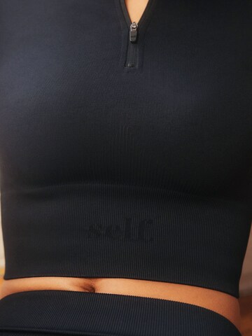 Maglietta di self. in nero