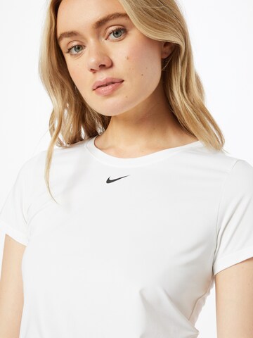 T-shirt fonctionnel NIKE en blanc